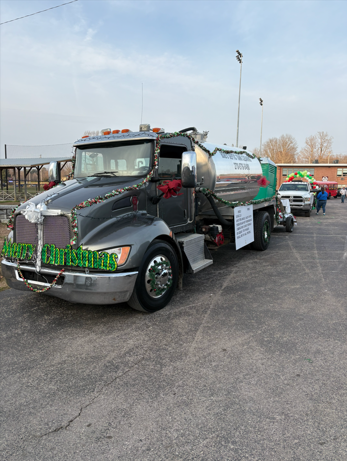 Bob's Septic Tank Cleaning service truck in a local Christmas parade